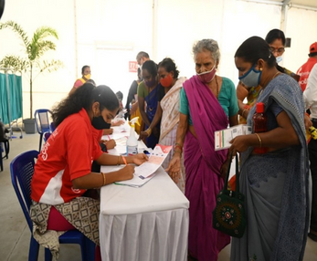 Camp registration desk with patients
