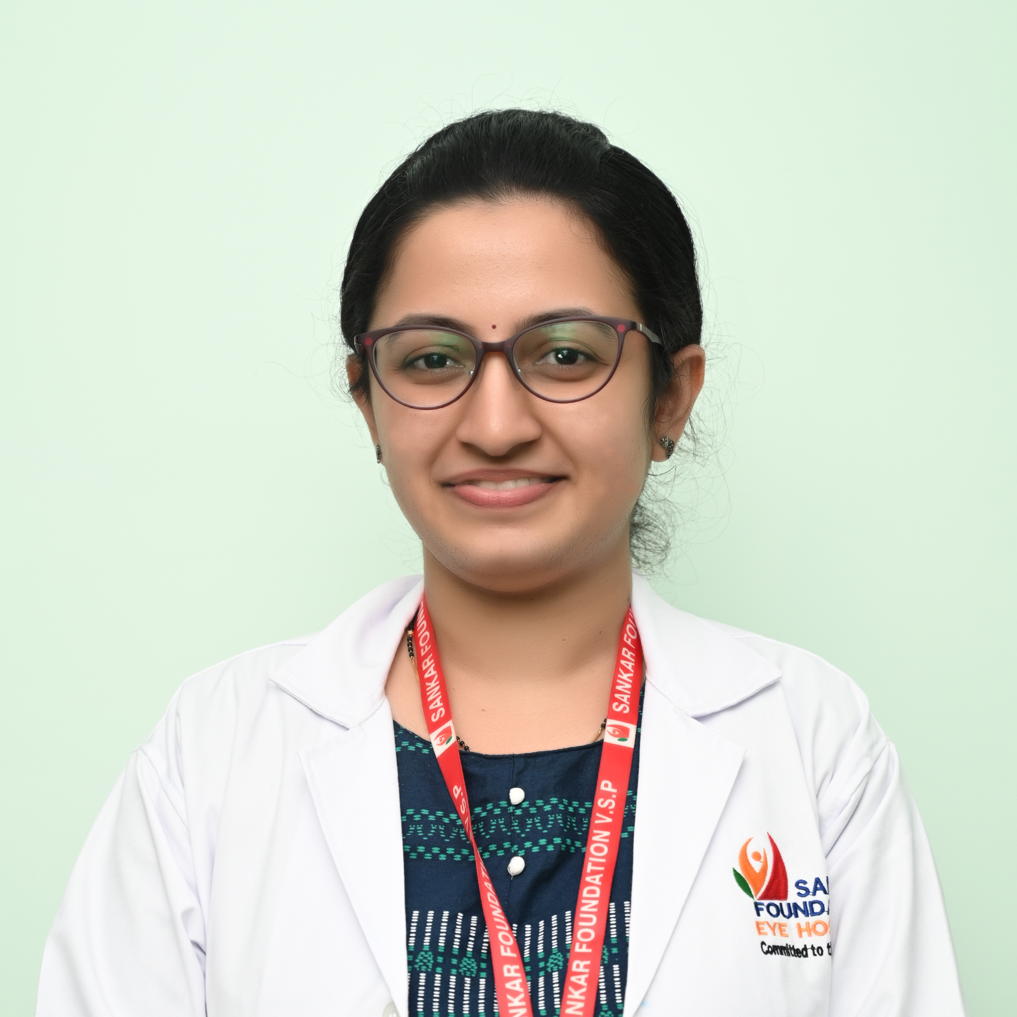 Dr. Raksha H V